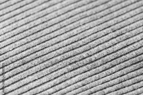 Gray knitwear as a texture and background close up