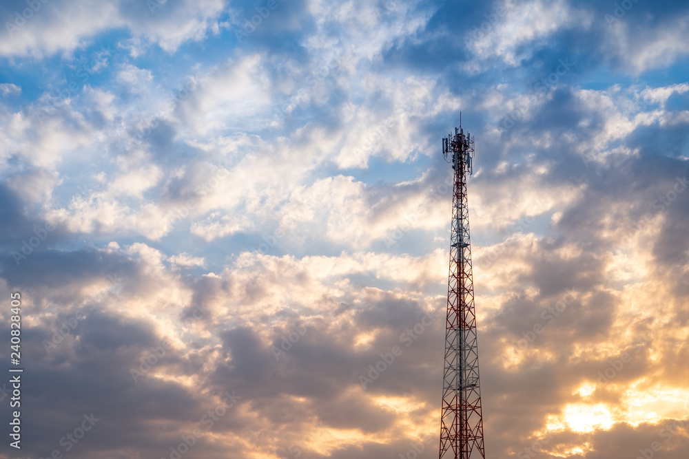 Telecommunication tower antenna for mobile phone 4G at sunset sky background Telecommunication tower antenna for mobile phone 4G at sunset sky background