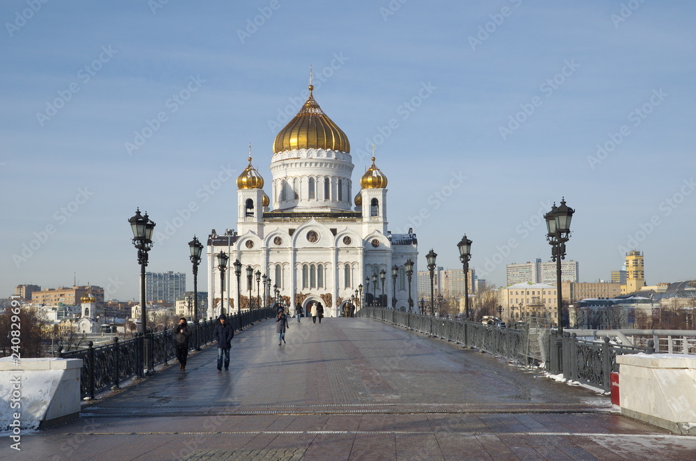 Moscow, Russia - January 25, 2018: View of the Cathedral of Christ the Saviour and the Patriarchal bridge on a Sunny winter day