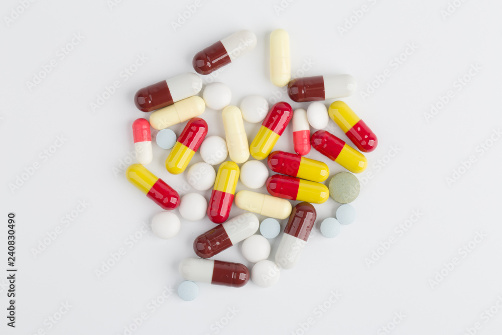 Medicine pills, tablets and capsules over white background Medicine pills, tablets and capsules over white background