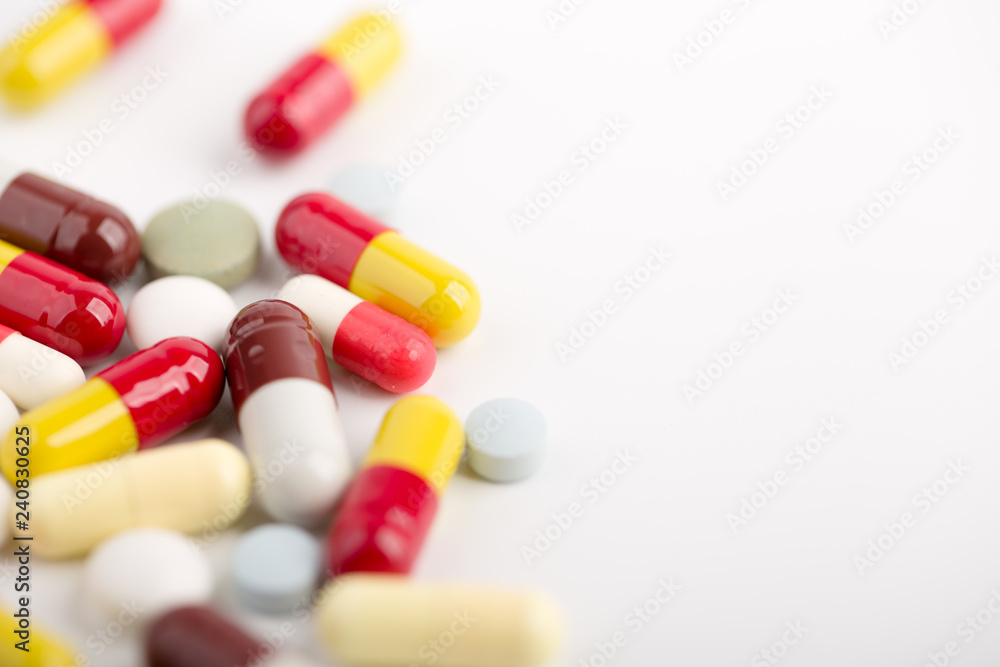 Medicine pills, tablets and capsules over white background Medicine pills, tablets and capsules over white background