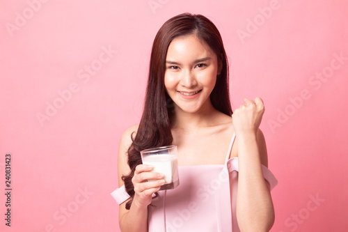 Healthy Young Asian woman drinking  milk