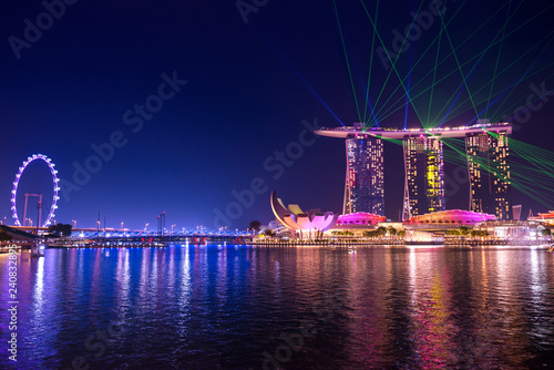 The beautiful atmosphere of the Marina Bay Sands and the Singapore flyer in the evening around the Marina Bay, Singapore.