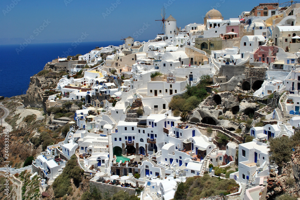  The beautiful white city of Oia located on the volcanic island of Santirini in the Aegean Sea