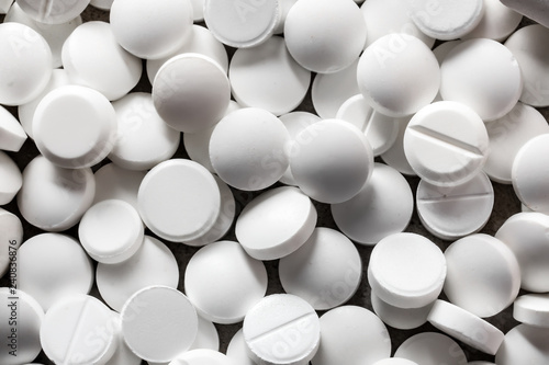 White pills as background