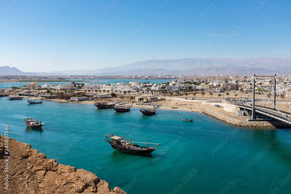 Traditional wooden dhow boats in Sur, Oman