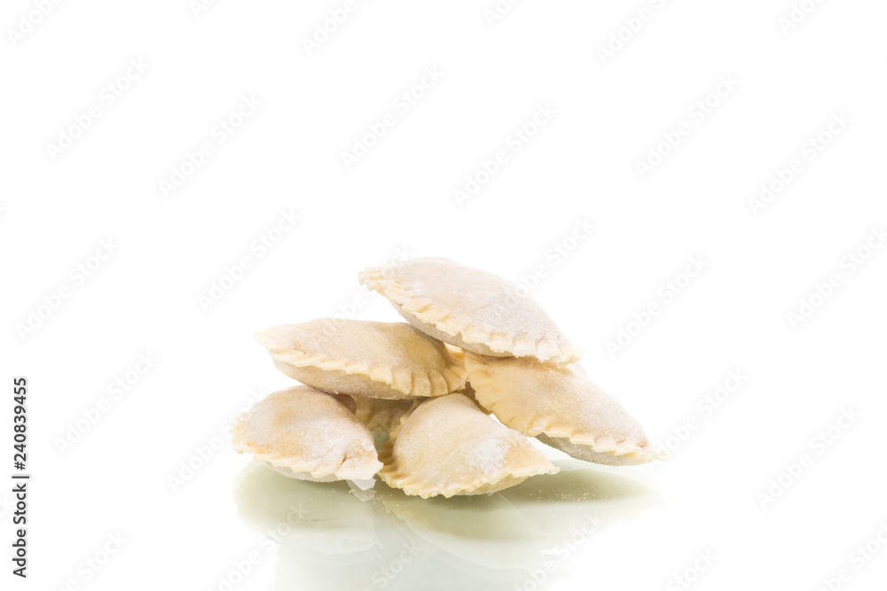 Dumplings raw with stuffing on a white background Dumplings raw with stuffing on a white background