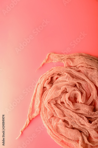 Gauze cloth on coral background photo