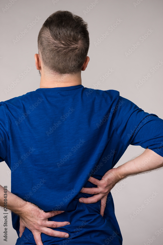 Man having back loins pain ache Man having back loins pain ache