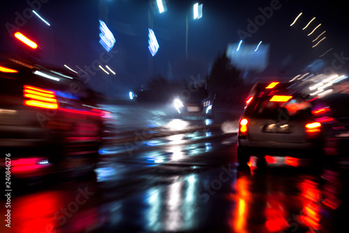 Heavy traffic moving on the road at night