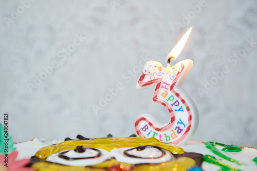 Birthday cake with burning candle тгьиук еркуу on grey background