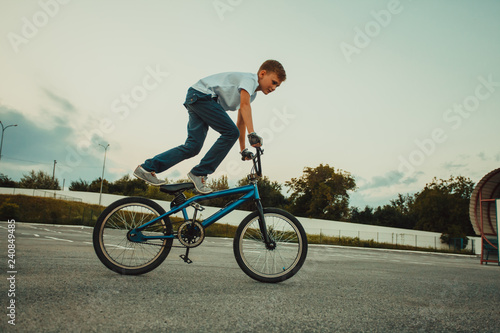Spectacular cycle tricks of young freerider boy