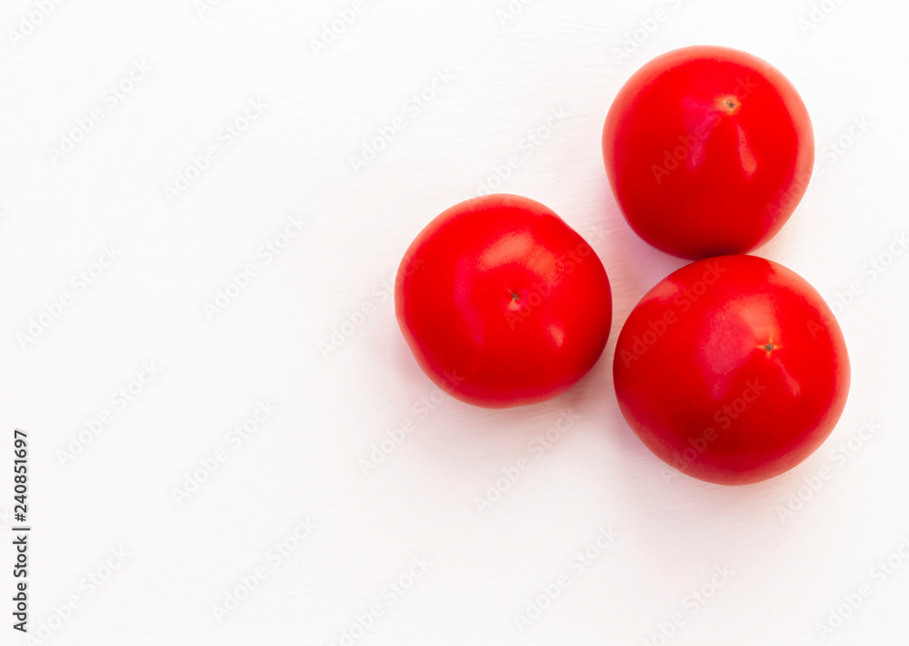 Fresh tomatoes isolated on white background with space for text Fresh tomatoes isolated on white background with space for text
