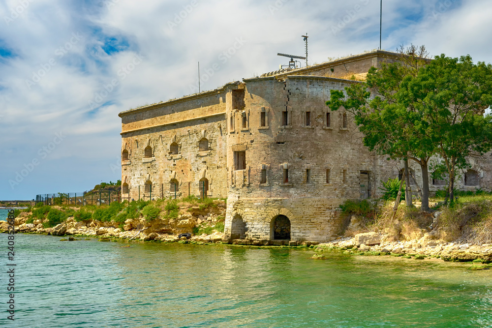 Old damaged by war fort in the Black Sea coast. Coastal Michael's fortress in Sevastopol, Crimea