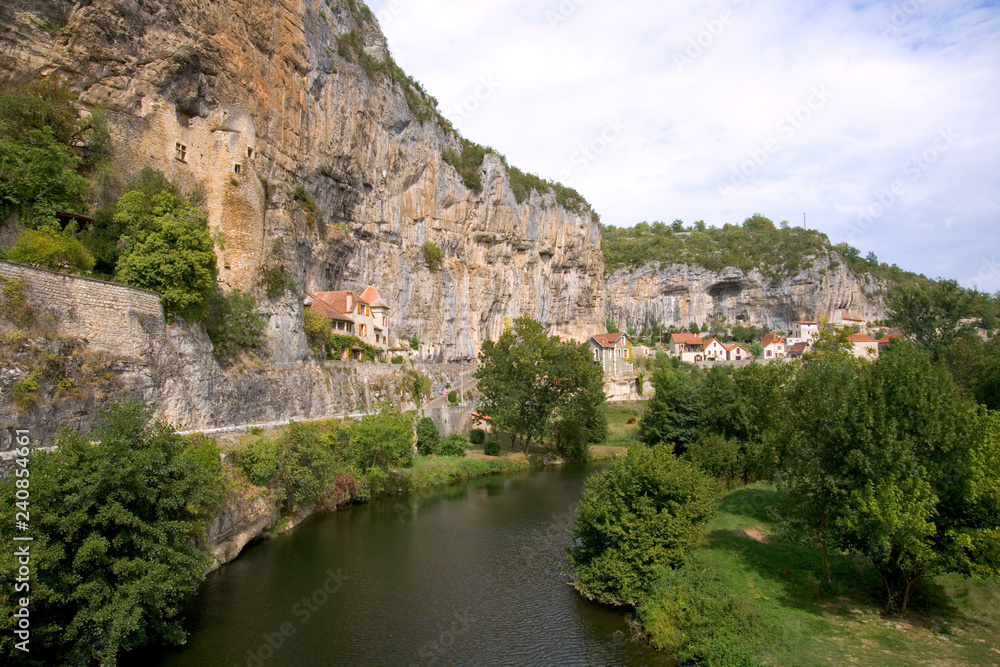 France, Quercy, Lot, quaint village houses built on the cliff above the River Cele at Cabrerets