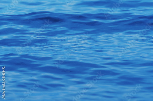 Deep blue ocean water wave at sea abstract nature marine background in blue tone.