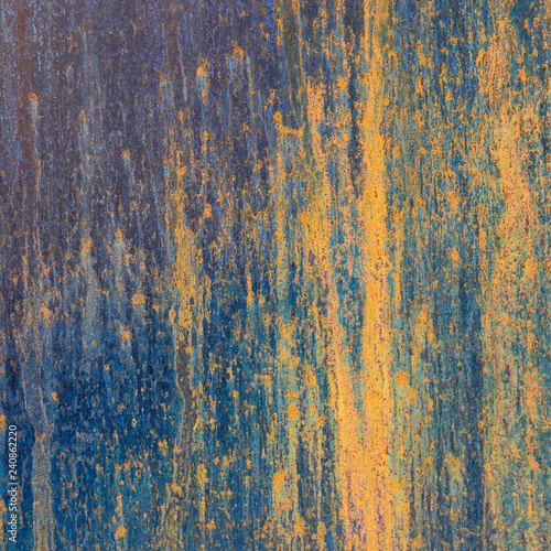 background of metal blue yellow brown rusty plate