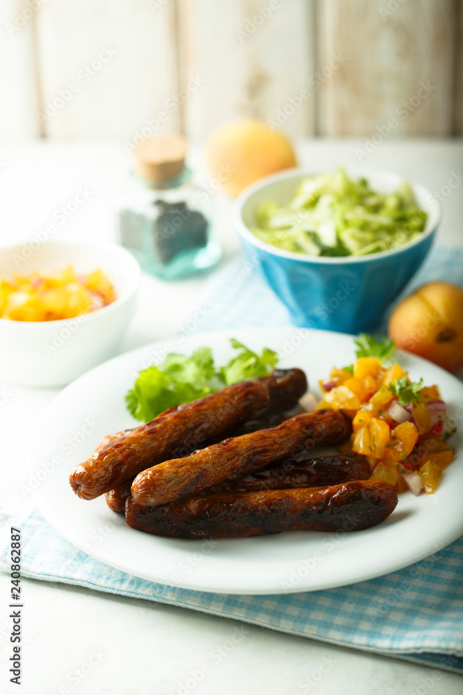 Fried sausages with fruit salsa Fried sausages with fruit salsa