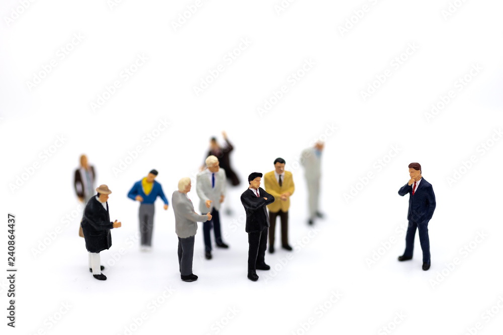 Miniature people: Group of businessmen work with team. Image use for background choice of the best suited employee, HR,job interview, job recruiter concepts. Miniature people: Group of businessmen work with team. Image use for background choice of the best suited employee, HR,job interview, job recruiter concepts.