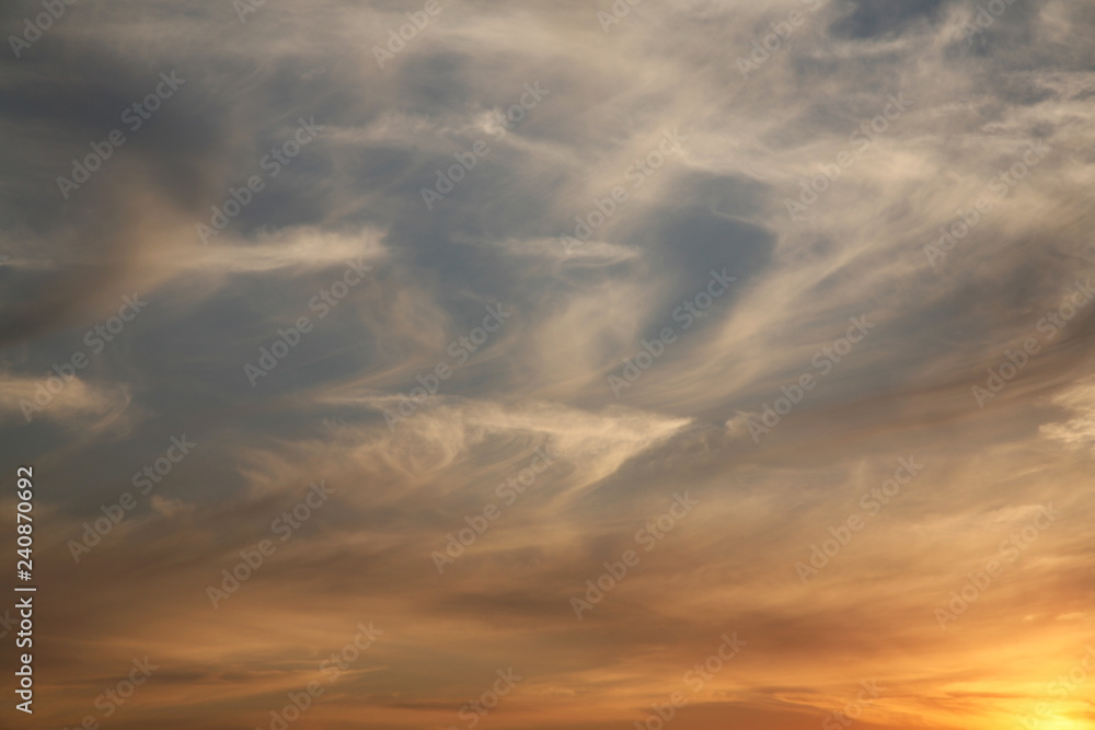 Sky clouds as the best picture. The most abstract background image of the sky. Beautiful sunset. The sun  rays illuminate the clouds.