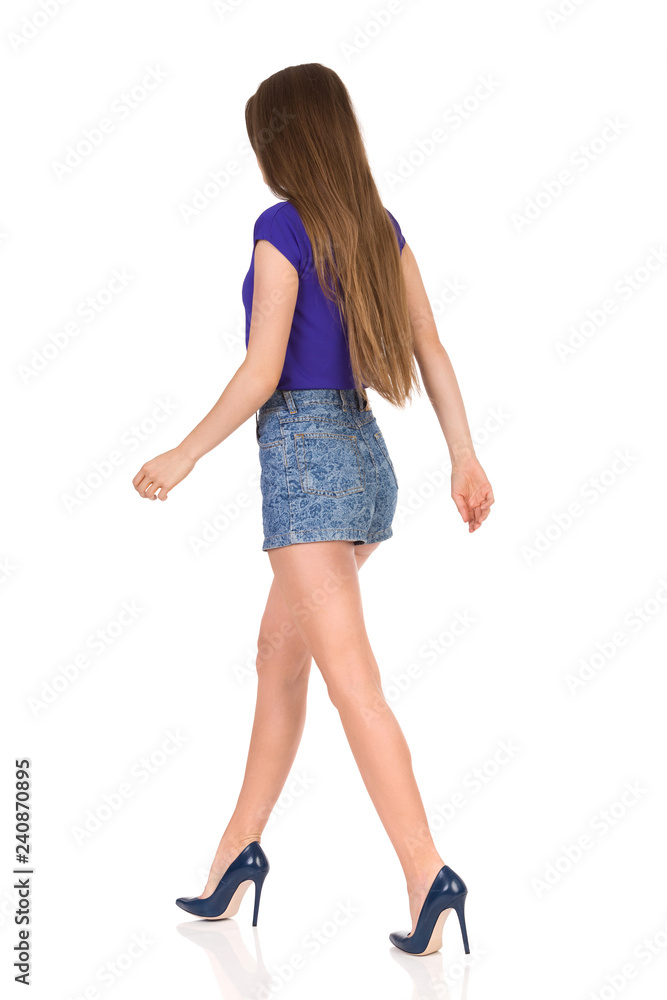 Walking Woman In Jeans Shorts And High Heels Walking Woman In Jeans Shorts And High Heels