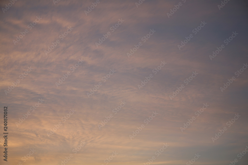Fototapeta premium Sky clouds as the best picture. The most abstract background image of the sky. Beautiful sunset. The sun rays illuminate the clouds.