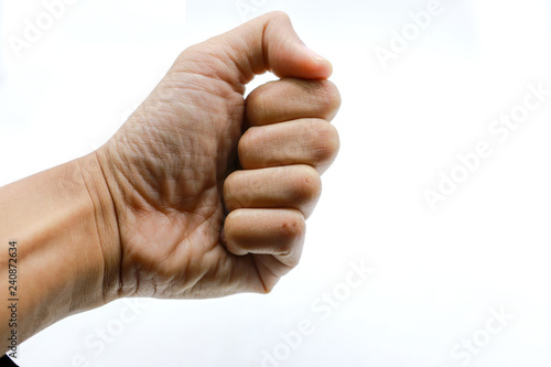 Male clenched fist, isolated on a white background, human hand gesture isolated on white background with copyspace
