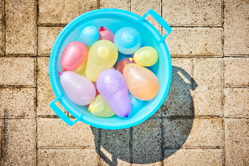 Water bomb stock in a bucket photo