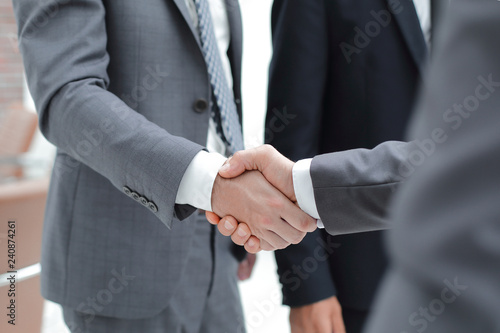 Cropped image of business people shaking hands © ASDF