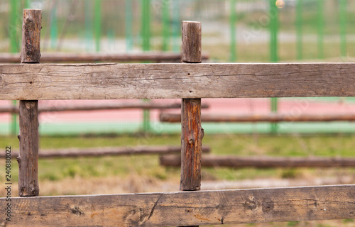 Wooden planks on the fence in the park