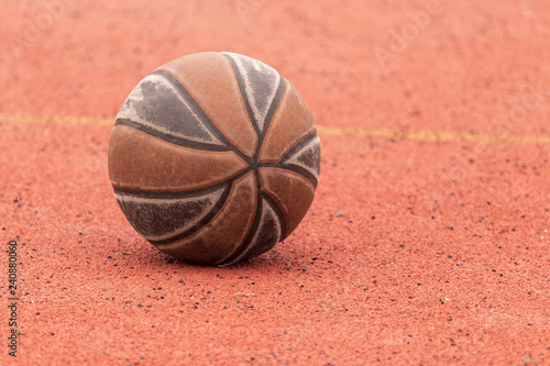 Basketball ball lying on the floor