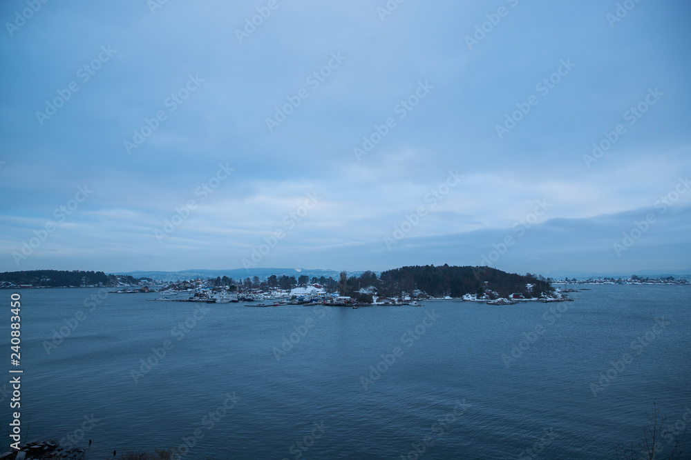 The islands around Oslo Norway during the winter overlooking the sea and the Fjord