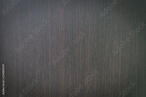 Dark wooden background with vertical pattern