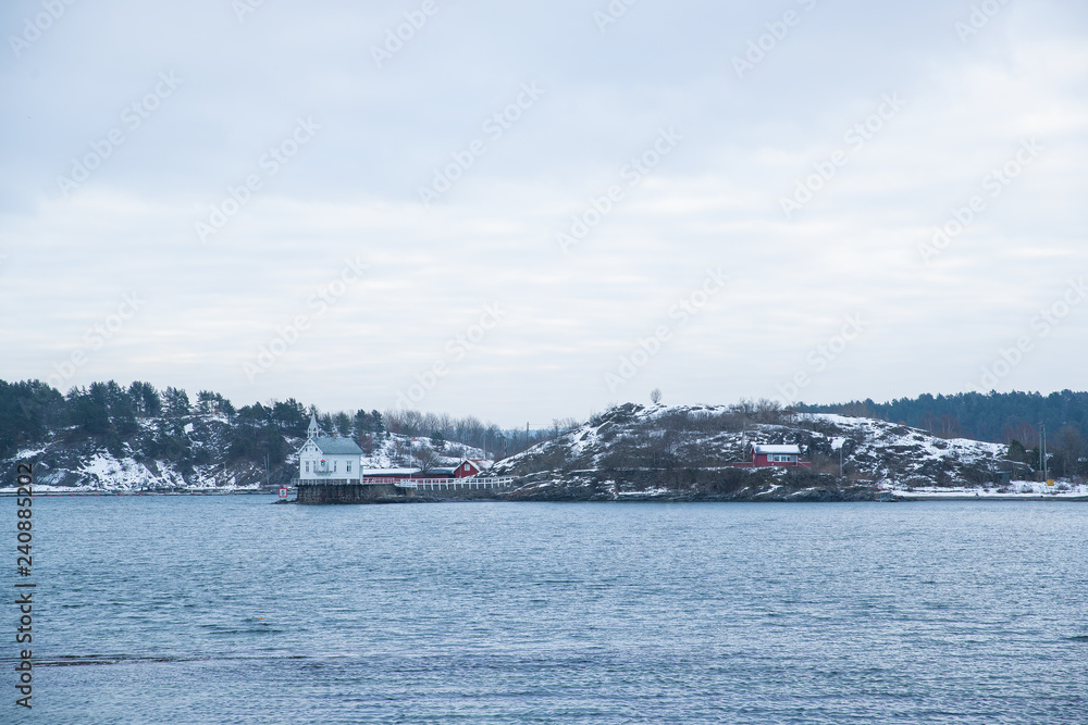 Overlooking landscape of the islands around Oslo Norway over the winter overlooking the sea and the Fjord during day