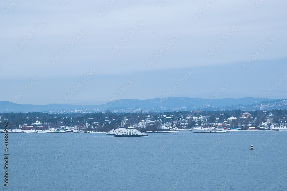 Overlooking landscape of the islands around Oslo Norway over the winter overlooking the sea and the Fjord during day