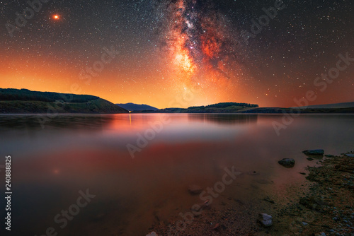Milky way galaxy on the lake. Night landscape 