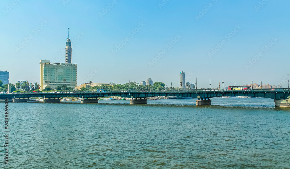 Panorama of the Nile River, view of the Cairo city bridges buildings and pyramids