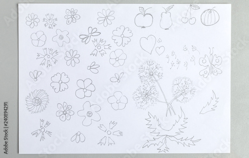 Kid drawings set of different flower heads fruits and butterfly.