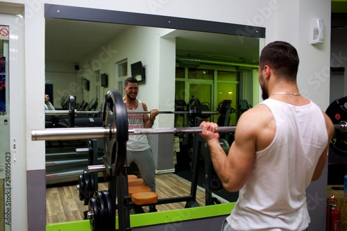 young man workout in gym 