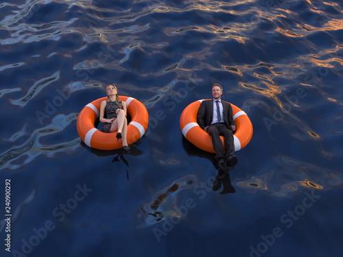 two office workers are floating on the rescue buoys, top view