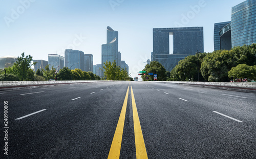 Empty road floor surface with modern city landmark buildings of hangzhou bund Skyline zhejiang china