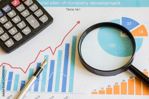 Business diagram document chart statistic magnifier search. photo