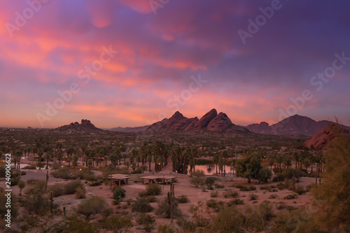 Stunning sunset over Phoenix, Arizona, Papago Park in foreground.