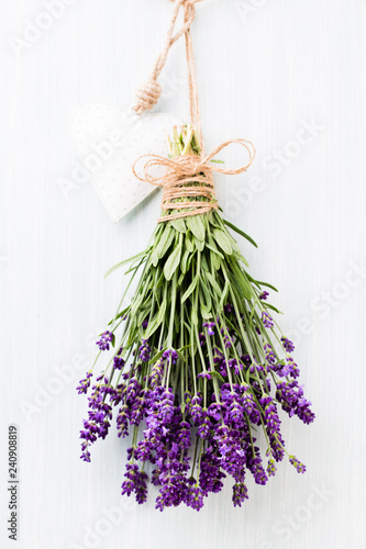 Fototapeta Naklejka Na Ścianę i Meble -  Lavender flowers, bouquet on rustic background, overhead.