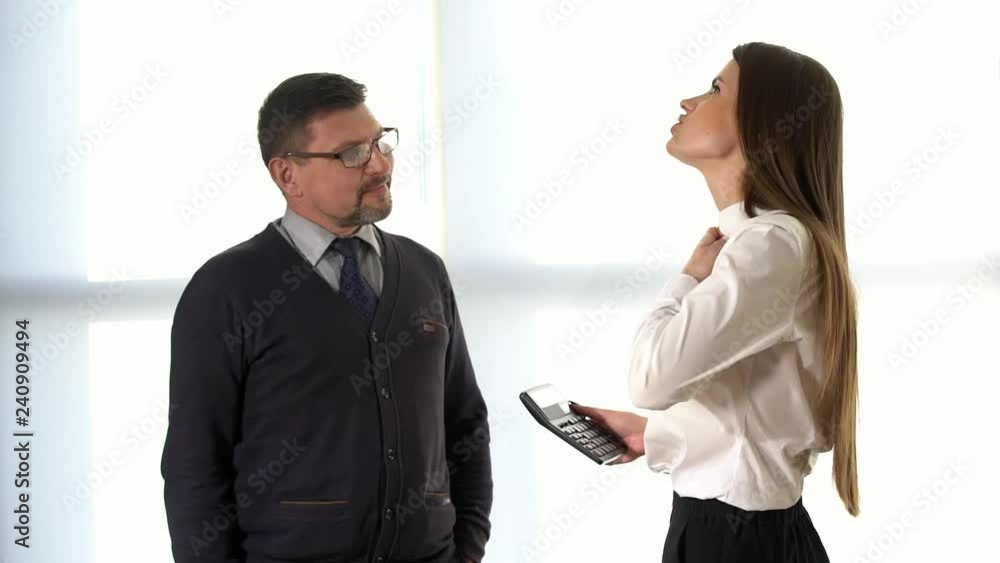 The average shooting plan, the big bad boss speaks to the subordinate in the office, the boss swears at the girl clerk, the manager discusses the project with the manager, conversation of the partners The average shooting plan, the big bad boss speaks to the subordinate in the office, the boss swears at the girl clerk, the manager discusses the project with the manager, conversation of the partners