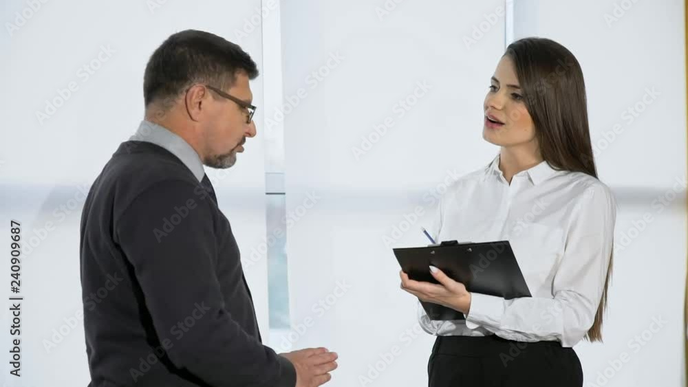 The average shooting plan, the big bad boss speaks to the subordinate in the office, the boss swears at the girl clerk, the manager discusses the project with the manager, conversation of the partners The average shooting plan, the big bad boss speaks to the subordinate in the office, the boss swears at the girl clerk, the manager discusses the project with the manager, conversation of the partners