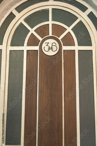 Number 38 on art deco door of building photo