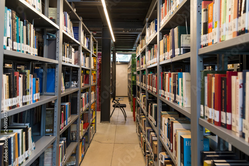 library concept for university or school. books ,table ,chair in the library.