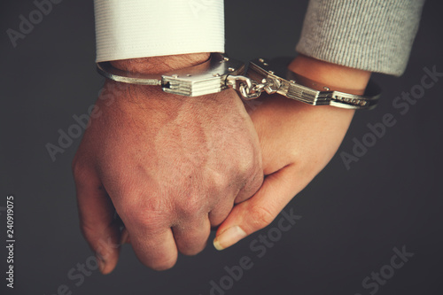 couple hand handcuffs