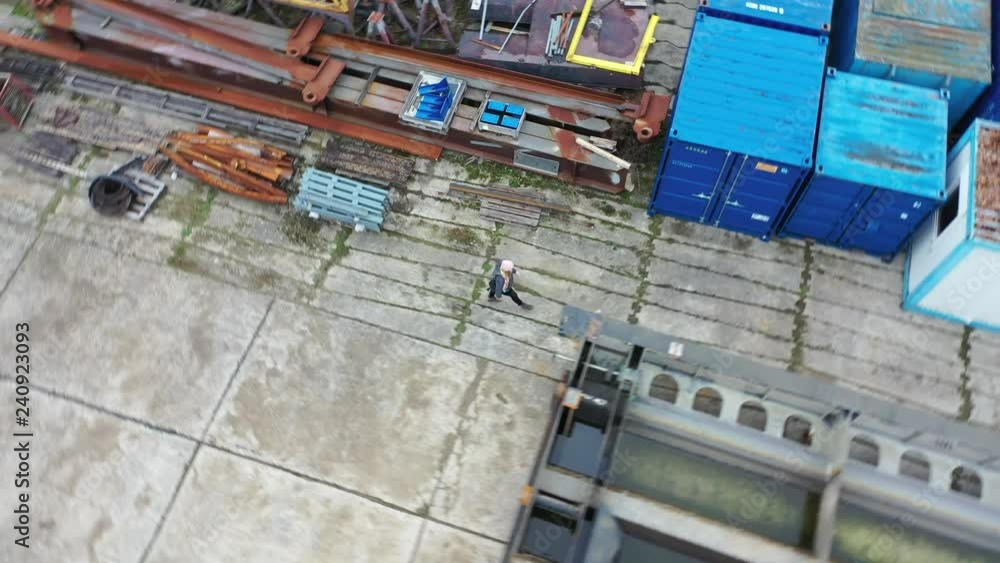 Drone Video: Girl Walking Through Industrial Area, Filmed on DJI Mavic Pro 2 in 4K using ActiveTrack 2.0 Drone Video: Girl Walking Through Industrial Area, Filmed on DJI Mavic Pro 2 in 4K using ActiveTrack 2.0
